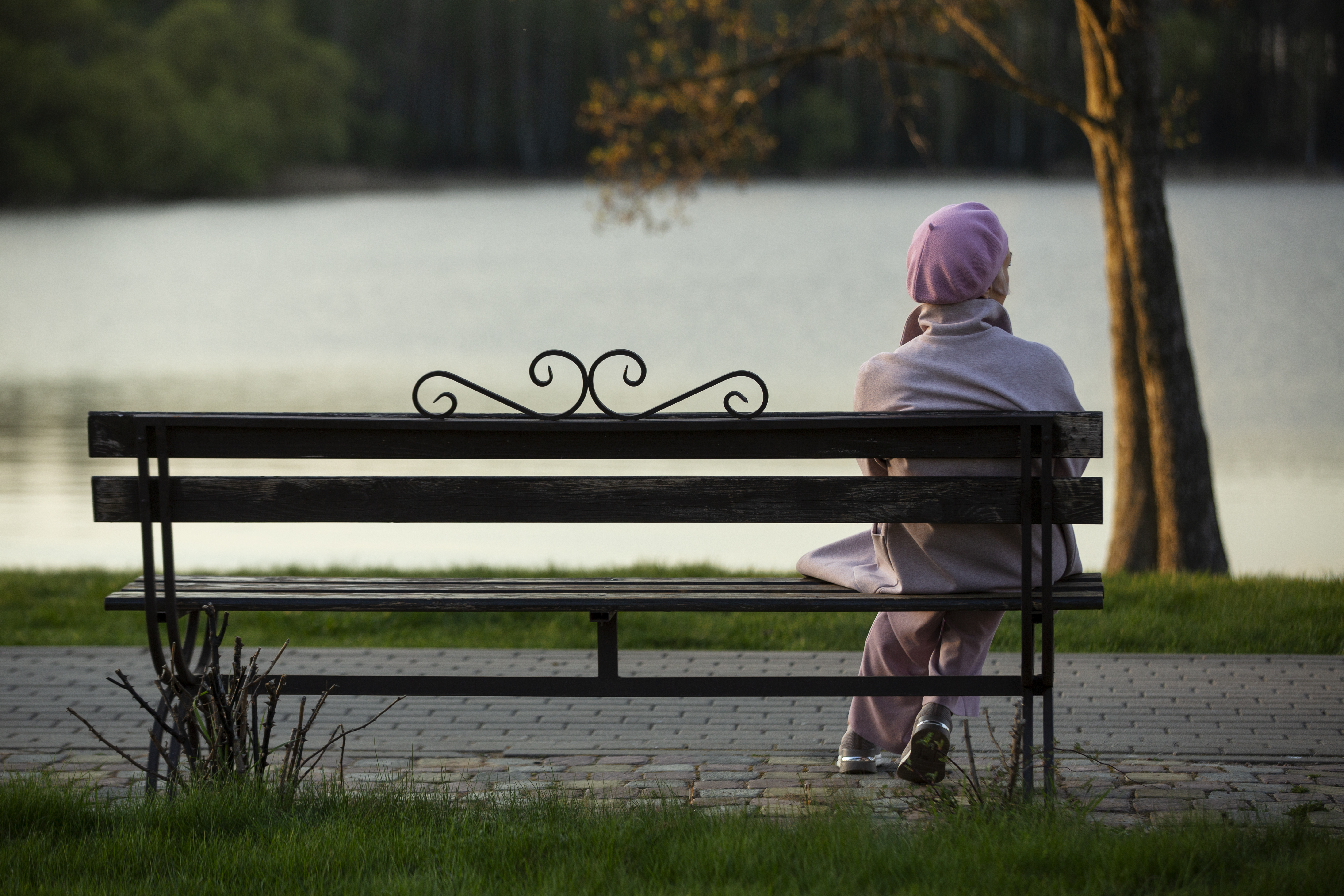 sad-contemplative-person-near-lake